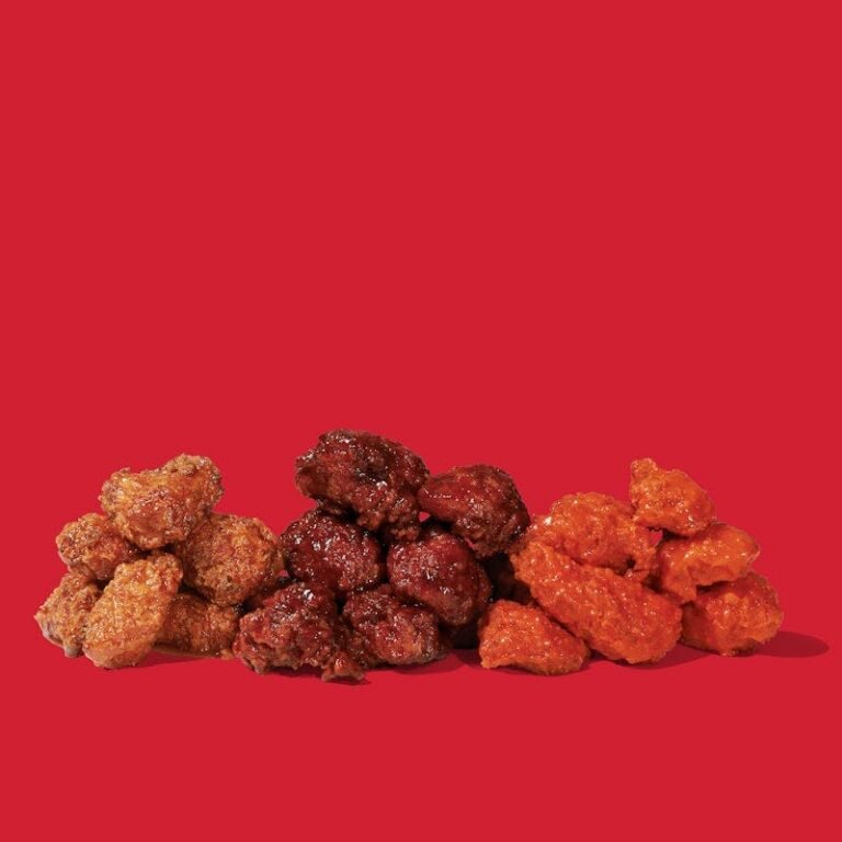 Dave’s Hot Chicken Flight of Saucy Bites with multiple sauce flavors