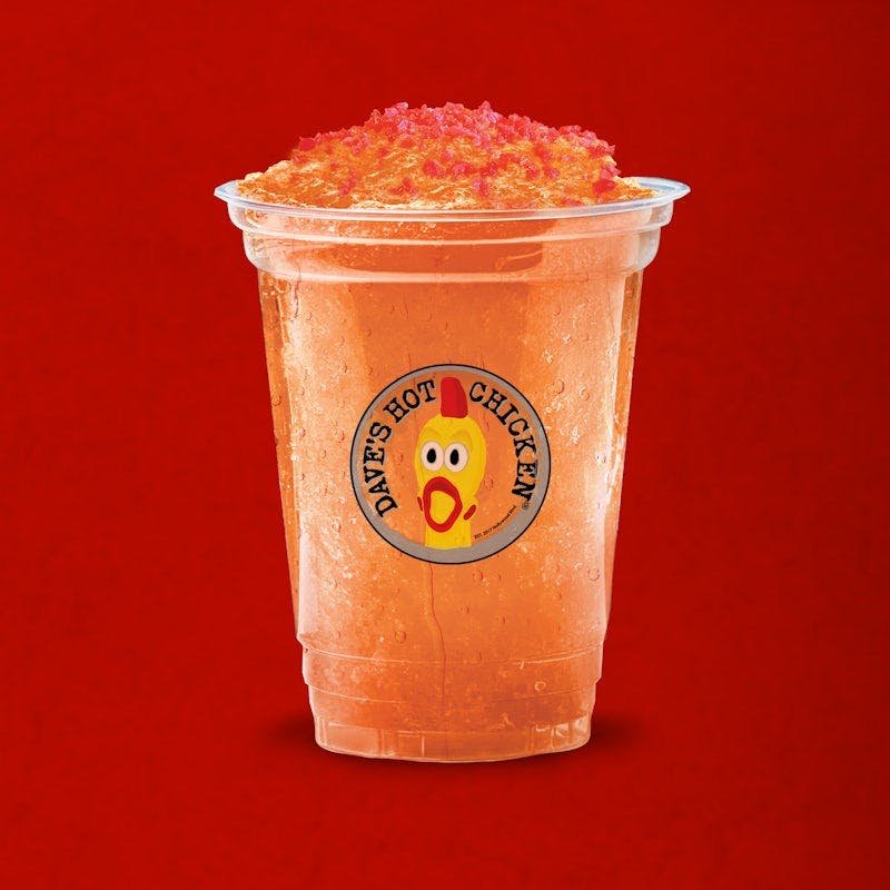 Dave’s Hot Chicken Orange LavaBurst Slusher topped with Pop Rocks