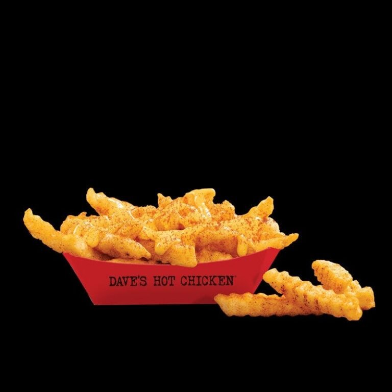 Dave’s Hot Chicken Reaper Cheese Fries with cheese sauce and spicy seasoning