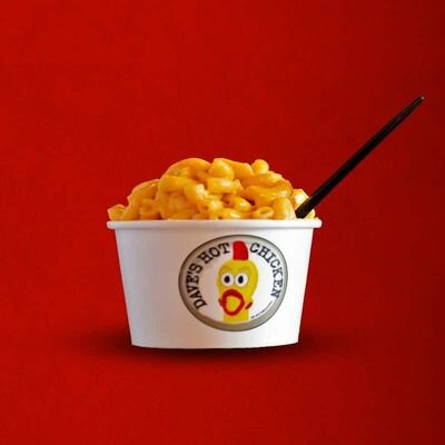 Dave’s Hot Chicken mac and cheese served in a branded cup