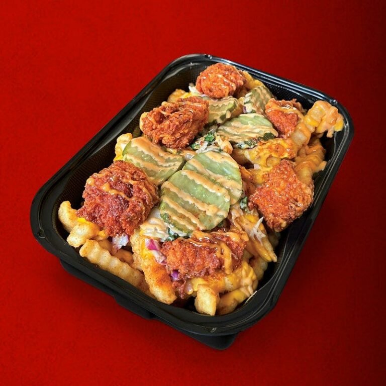 Dave’s Hot Chicken regular Top-Loaded Fries with Dave’s Bites
