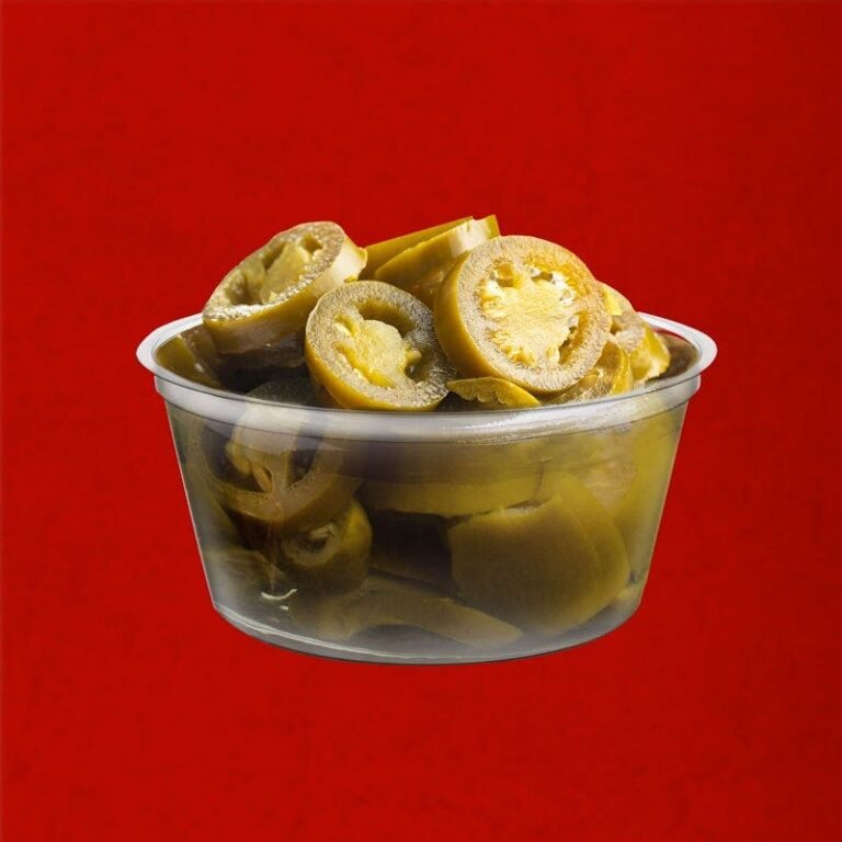 side of sliced jalapeños from Dave’s Hot Chicken