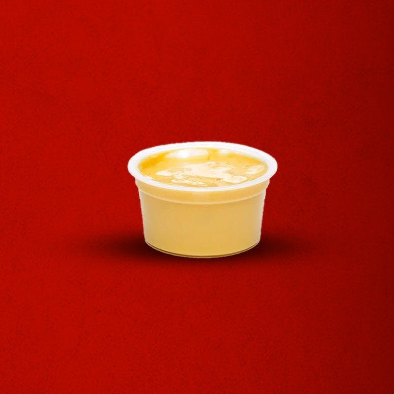 small side of Dave’s Hot Chicken cheese sauce